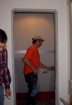 Fred snips wire lath to fit as backer for shower tile