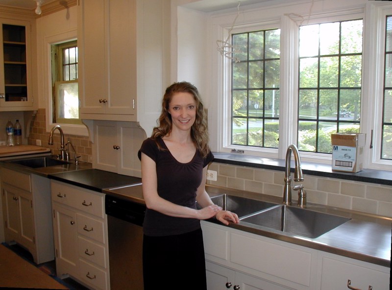 Maire shows off sink and broad window sill.