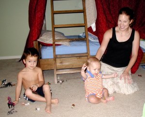 Calvin and Levi play make believe with their Mom, Katherine