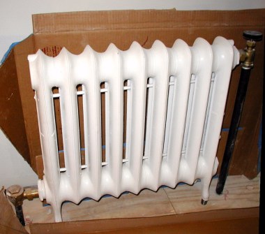 Beautiful, shining white radiator, ready for another heating season