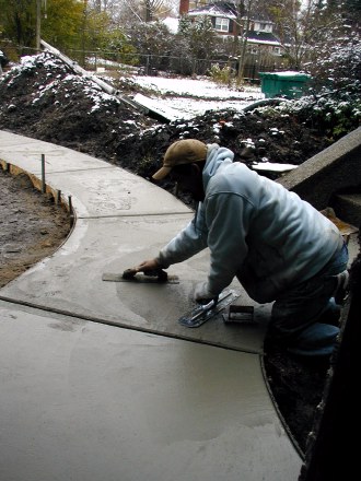 Washed aggregate walkway is tooled