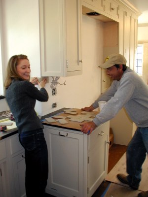 Fred Peters lays out tile corner with Marie