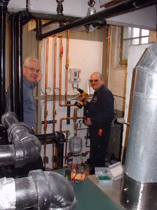 Douglas and Charles complete control device installation for heat loop project