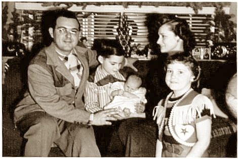 Little Tommie is introduced to Grask Trailer Sales and the rest of his family in this January 2, 1952, photo