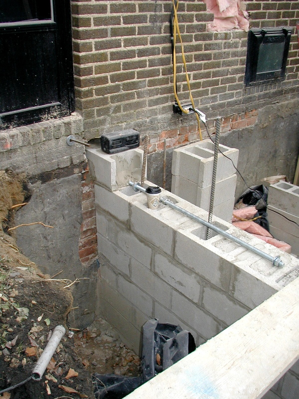 New foundation being 'toothed' into existing.