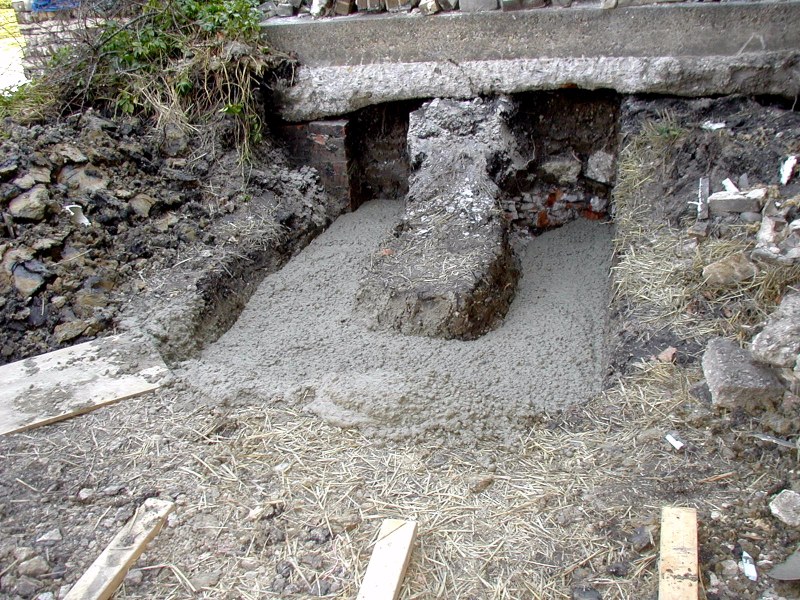 Freshly poured 48-inch deep footers will be leveled to support new terrace steps.